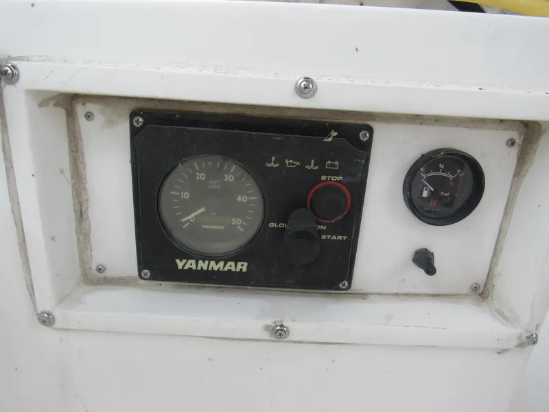 Slide: The Image of Control panel of a 1986 Catalina 36 sailboat with Yanmar engine gauges. - 3