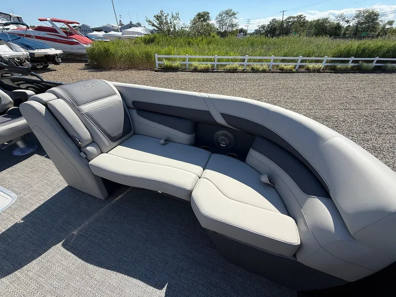 Slide: The Image of Luxurious seating on 2025 Barletta C22UC pontoon boat, featuring sleek gray upholstery. - 8