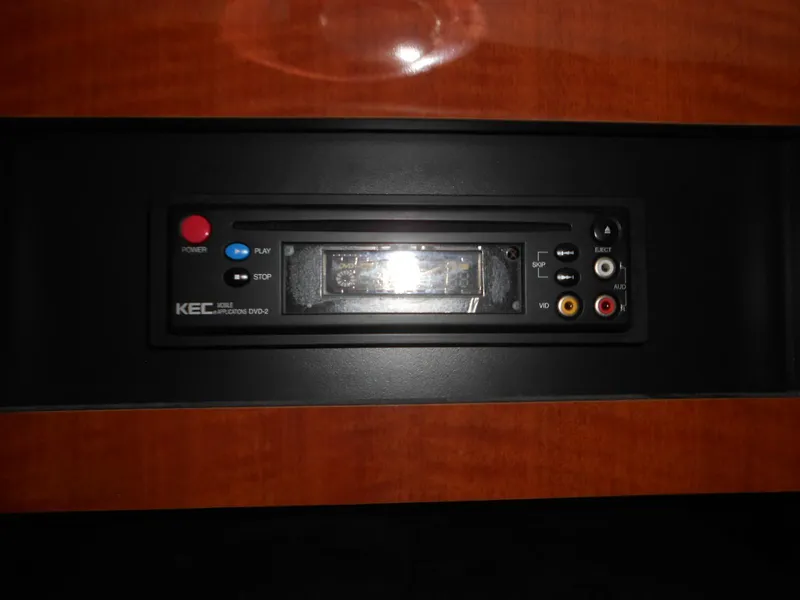 Slide: The Image of KEC DVD player in 2005 Sea Ray 340 Sundancer boat interior. - 16