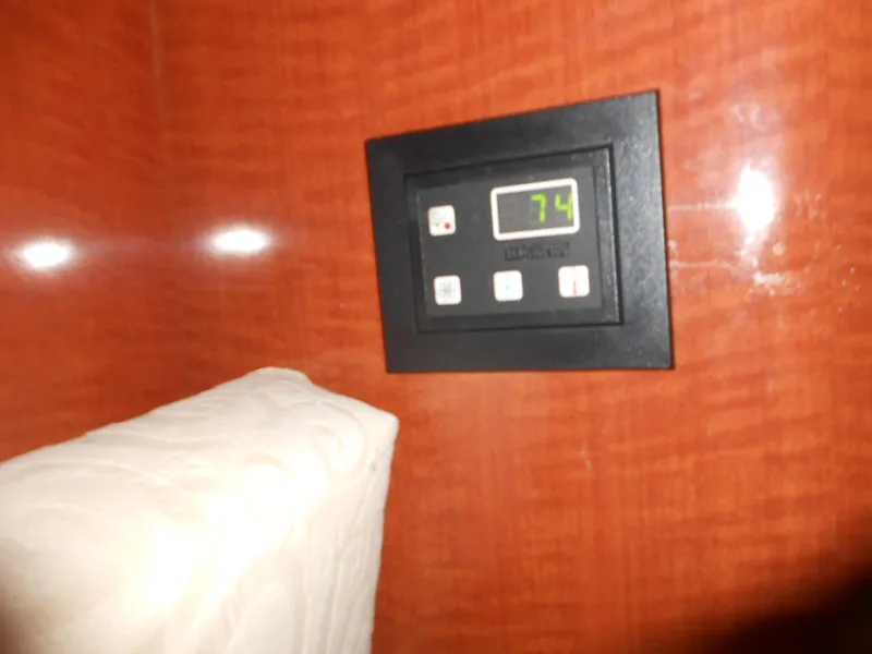 Slide: The Image of Digital thermostat on 2005 Sea Ray 340 Sundancer boat interior. - 17