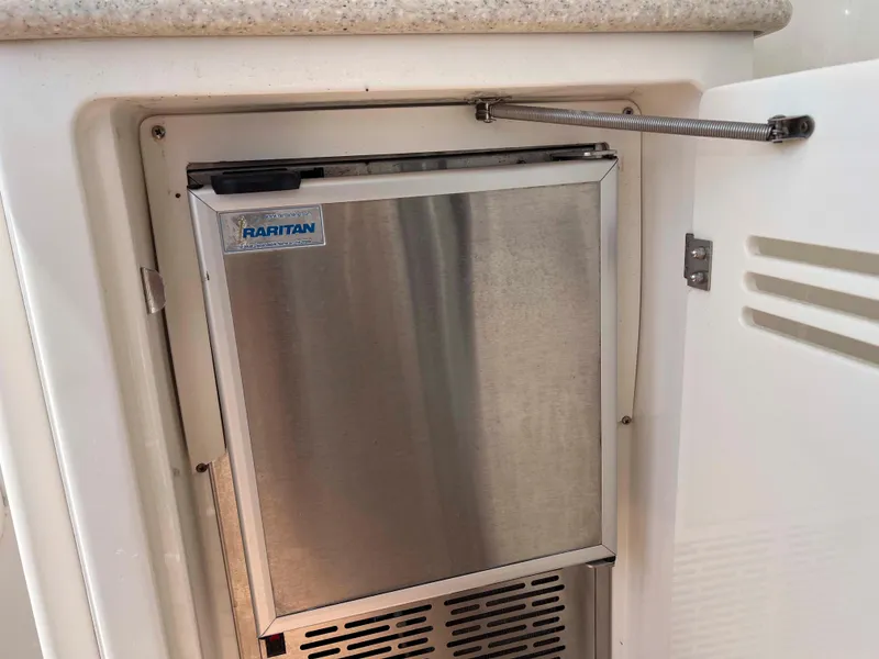 Slide: The Image of Built-in Raritan ice maker on 2005 Silverton 38 Sport Bridge yacht. - 11