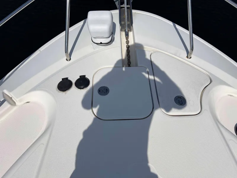 Slide: The Image of Bow deck of 2005 Silverton 38 Sport Bridge with anchor chain and fittings. - 15