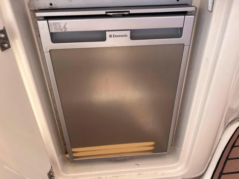 Slide: The Image of Dometic fridge on 2005 Silverton 38 Sport Bridge yacht. - 32