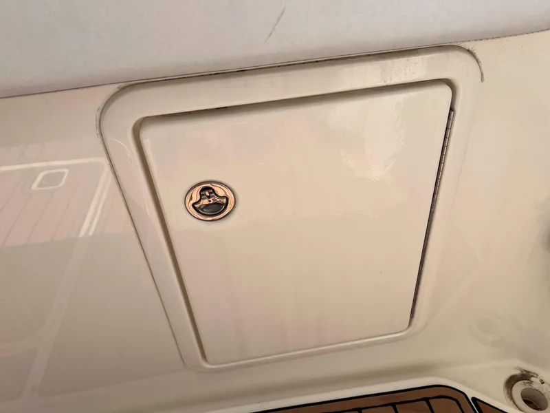 Slide: The Image of Hatch door on a 2005 Silverton 38 Sport Bridge boat. - 36