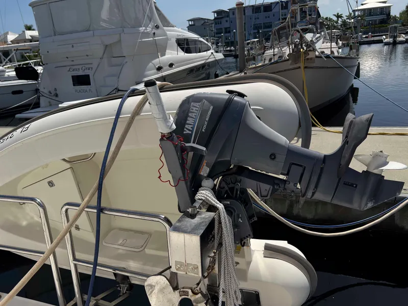 Slide: The Image of 2005 Silverton 38 Sport Bridge with Yamaha outboard motor at marina dock. - 9