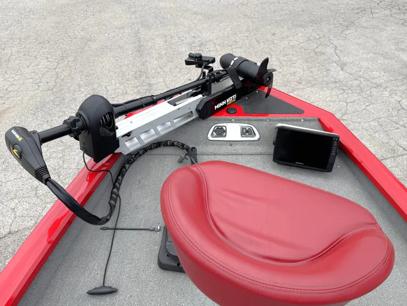 Slide: The Image of 2012 Tracker Pro Team 175 TXW boat with Minn Kota motor and Garmin display. - 14