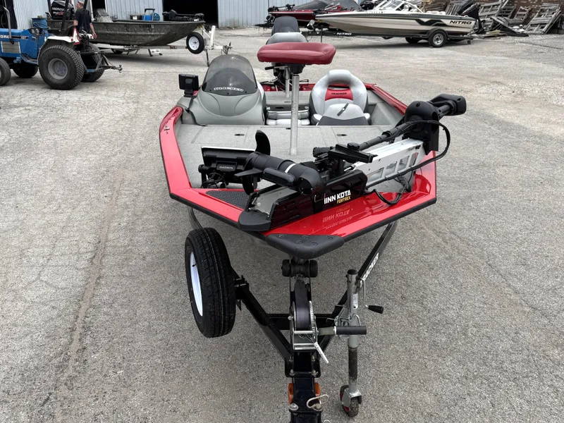 Slide: The Image of 2012 Tracker Pro Team 175 TXW boat with Minn Kota trolling motor on trailer. - 3