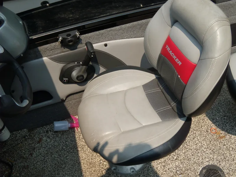 Slide: The Image of 2015 Tracker Targa V-18 WT boat seat and control panel. - 8