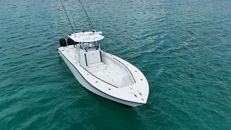 Slide: The Image of 2017 Yellowfin 36 Offshore boat on clear blue water. - 15