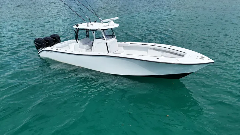 Slide: The Image of 2017 Yellowfin 36 Offshore boat on clear blue water. - 18