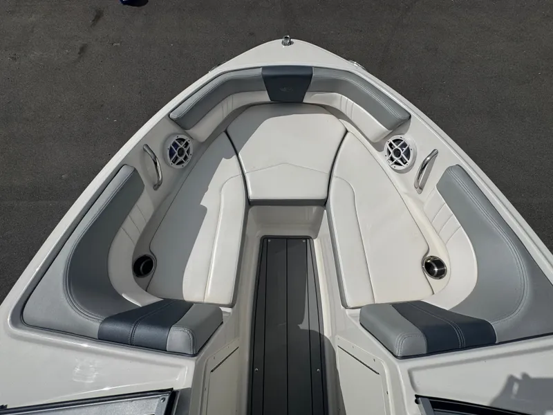 Slide: The Image of 2021 Chaparral 19 SSI Sport boat interior with gray and white seating. - 10