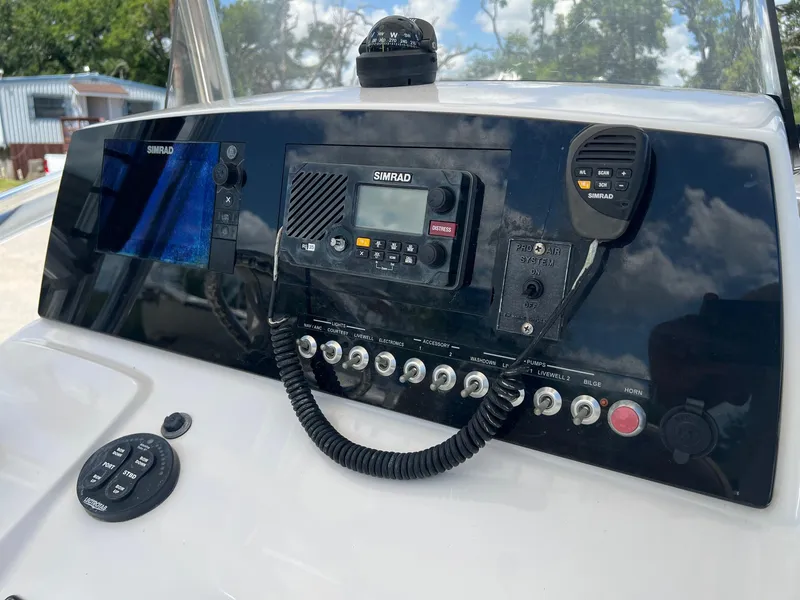 Slide: The Image of Control panel of a 2015 Sportsman Masters 247 Bay Boat with Simrad electronics. - 10