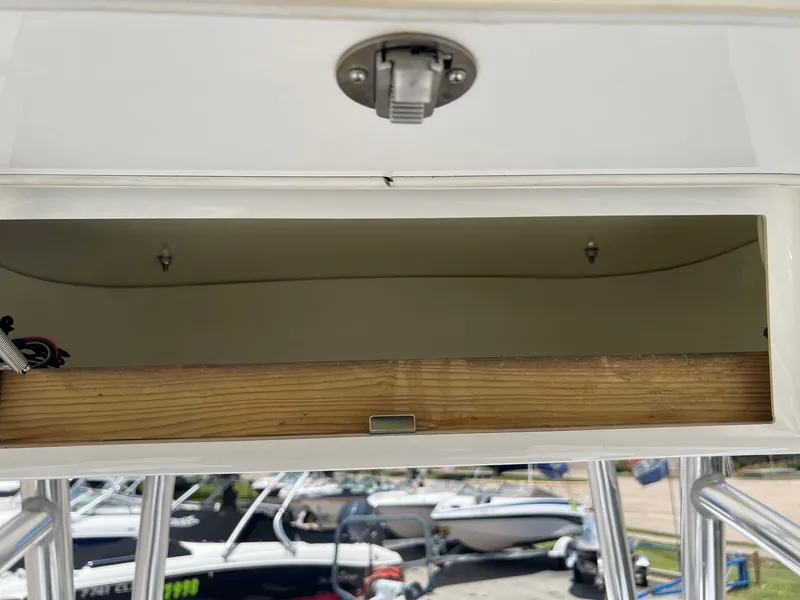 Slide: The Image of Open storage compartment on a 2015 Sportsman Masters 247 Bay Boat. - 20