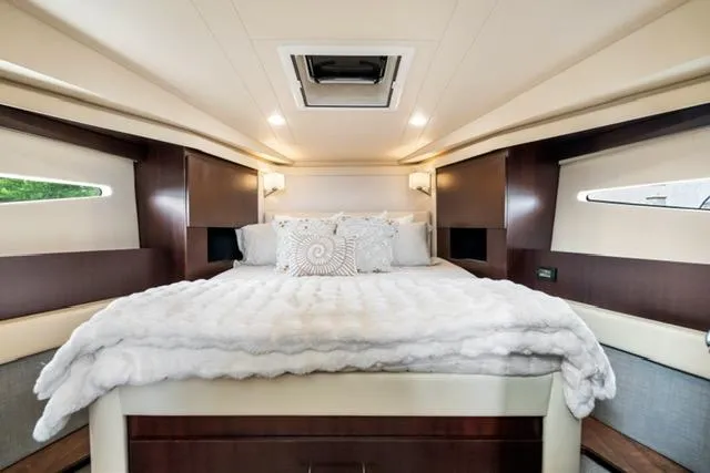 Slide: The Image of Luxurious interior of 2017 Regal 42 Grande Coupe yacht bedroom. - 16