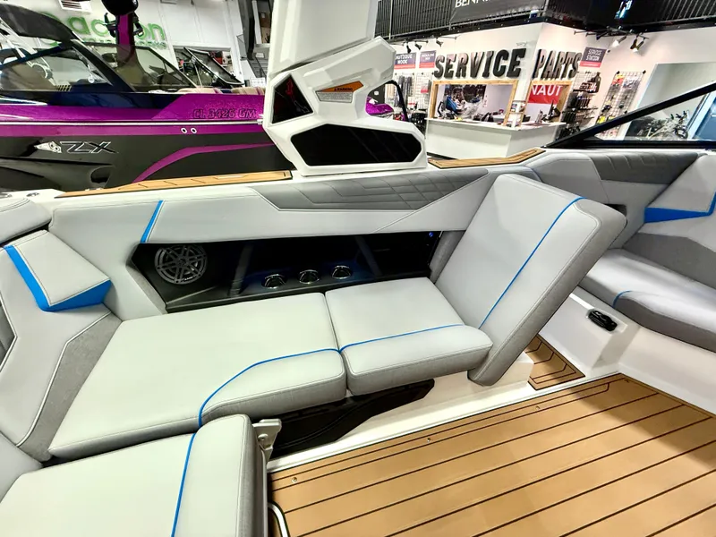 Slide: The Image of 2025 Nautique Super Air Nautique S23 interior with luxurious seating and modern design. - 25