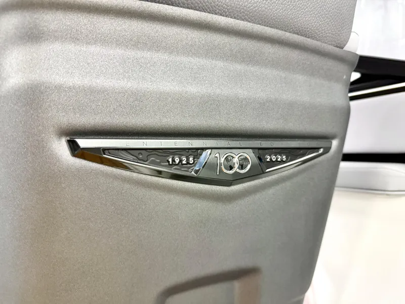 Slide: The Image of Centennial edition badge on 2025 Nautique Super Air Nautique S23 boat interior. - 44
