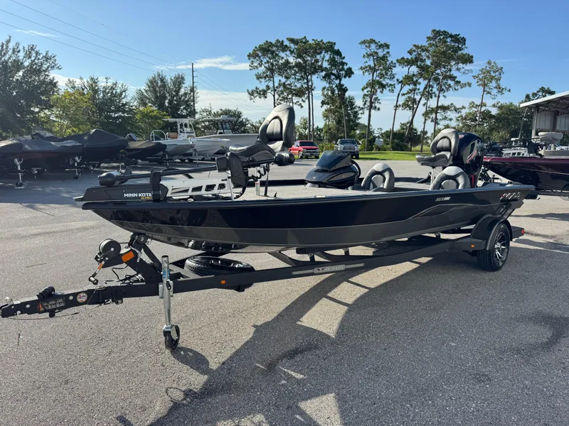 Slide: The Image of 2026 Vexus AVX1980 boat on trailer in sunny outdoor setting. - 1