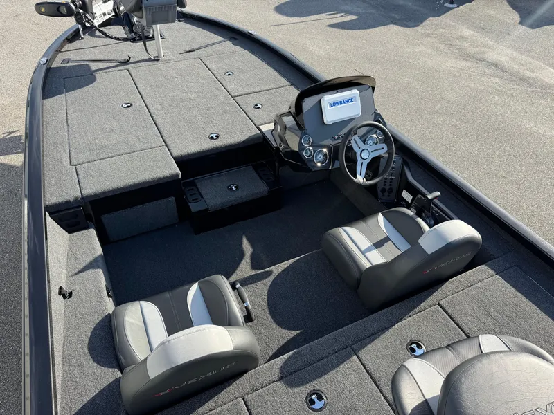 Slide: The Image of 2026 Vexus AVX1980 boat interior with dual seats and steering console. - 13