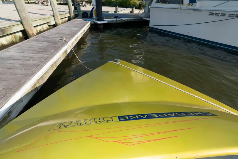 Slide: The Image of Yellow Smokey Mountain Jet Boat docked, 2014 model, Chesapeake Nautical Cruises branding. - 9
