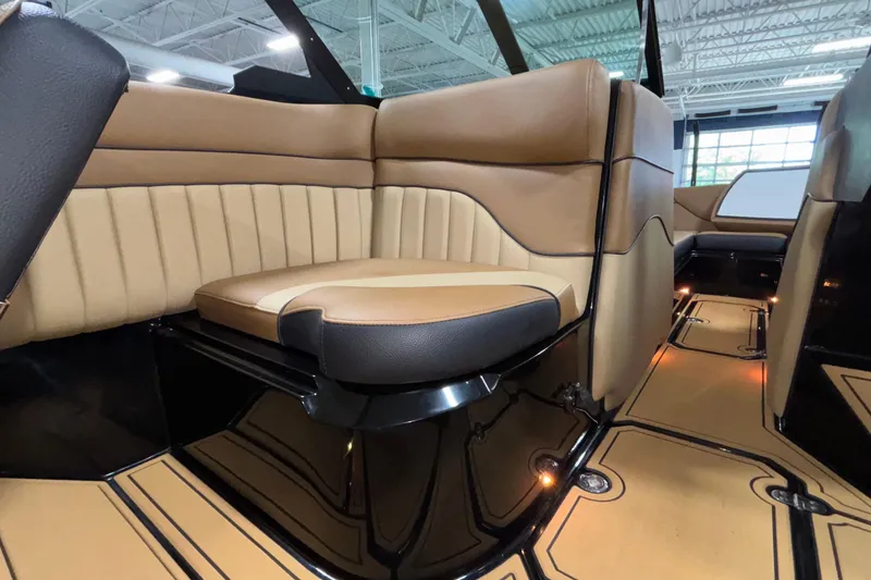 Slide: The Image of Luxurious interior of 2025 MB B52 25 Alpha boat with tan leather seating. - 10