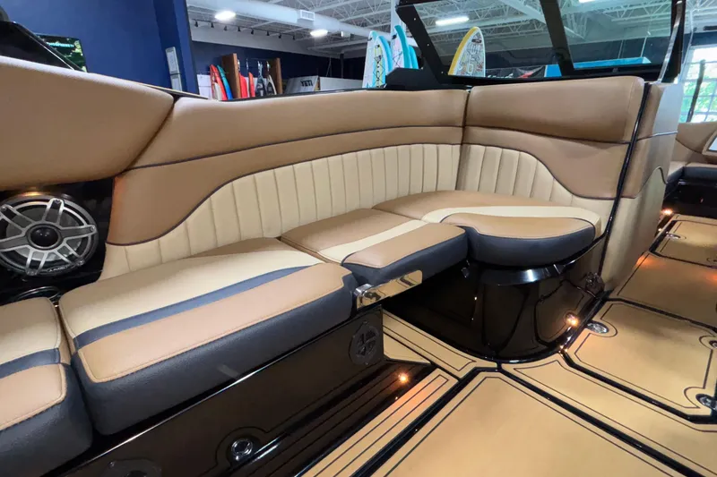 Slide: The Image of Luxurious interior of 2025 MB B52 25 Alpha boat with tan leather seating. - 12