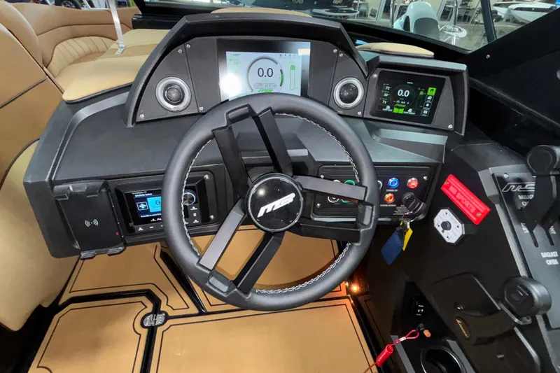 Slide: The Image of 2025 MB B52 25 Alpha boat dashboard with modern controls and digital displays. - 20