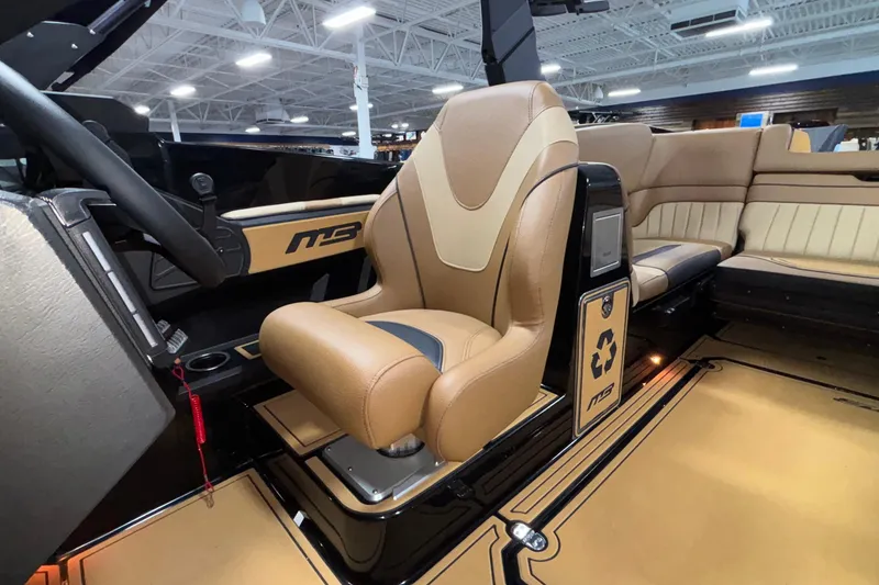 Slide: The Image of Luxurious interior of 2025 MB B52 25 Alpha boat with tan leather seating. - 28