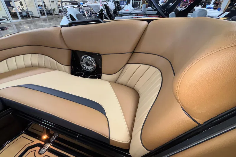 Slide: The Image of Luxurious interior of 2025 MB B52 25 Alpha boat with tan leather seating. - 34
