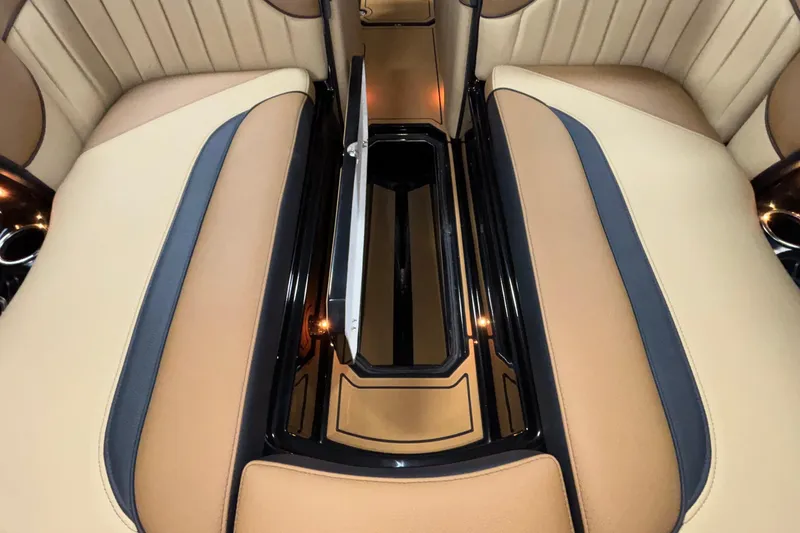 Slide: The Image of Luxurious interior of 2025 MB B52 25 Alpha with beige and navy seating. - 38