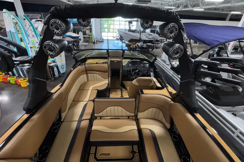 Slide: The Image of Luxurious interior of 2025 MB B52 25 Alpha boat with premium seating and speakers. - 4