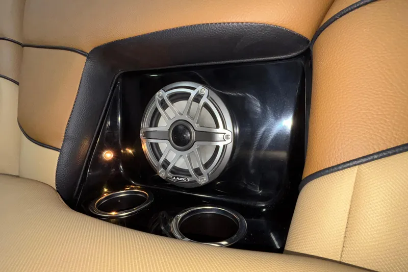 Slide: The Image of Luxury interior of MB B52 25 Alpha 2025 with JL Audio speaker and cup holders. - 40