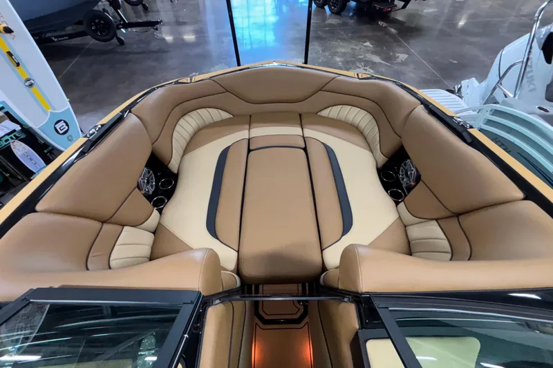 Slide: The Image of Luxurious interior of 2025 MB B52 25 Alpha boat with tan leather seating. - 43