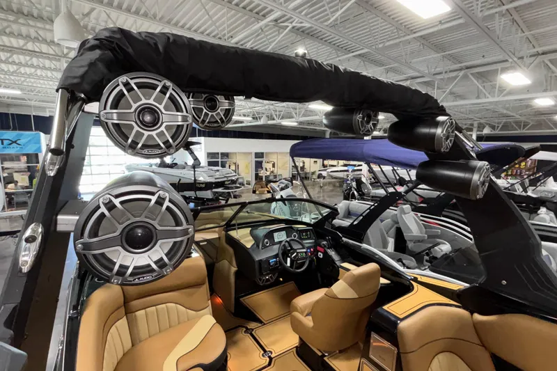 Slide: The Image of 2025 MB B52 25 Alpha boat interior with premium audio system and luxurious seating. - 45