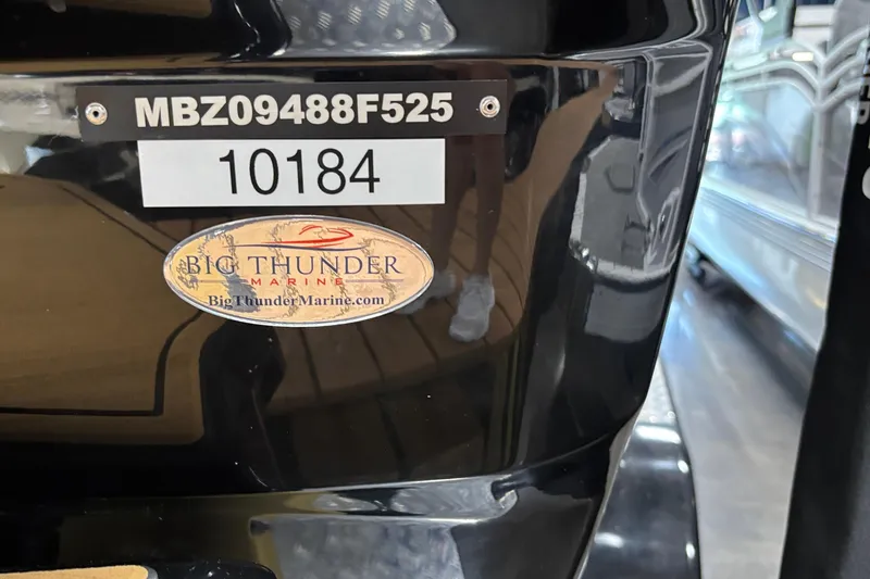 Slide: The Image of Close-up of a 2025 MB B52 25 Alpha boat with Big Thunder Marine logo. - 57