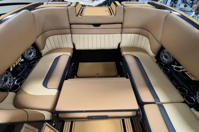 Slide: The Image of Luxurious interior of 2025 MB B52 25 Alpha boat with tan leather seating. - 59