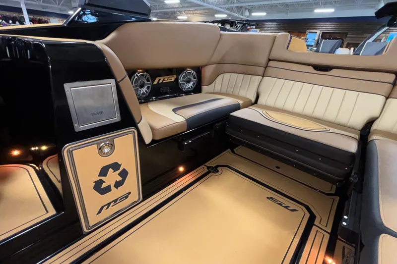 Slide: The Image of Luxurious interior of 2025 MB B52 25 Alpha boat with premium seating and sound system. - 7