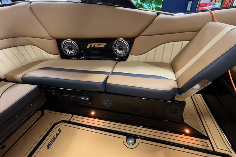 Slide: The Image of Luxurious interior of 2025 MB B52 25 Alpha boat with premium seating and sound system. - 9