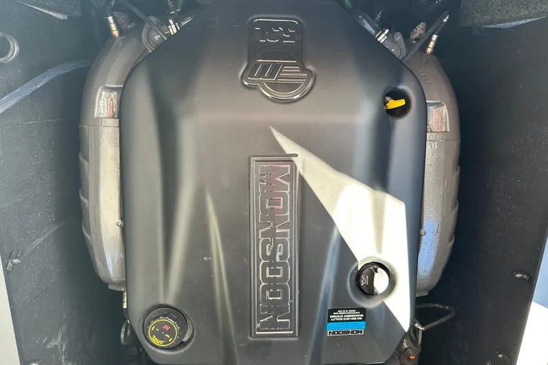 Slide: The Image of 2026 Axis A225 engine compartment with Monsoon cover, showcasing modern design and components. - 8