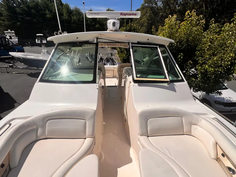 Slide: The Image of 2016 Grady-White Freedom 375 boat with spacious seating and Raymarine equipment. - 10