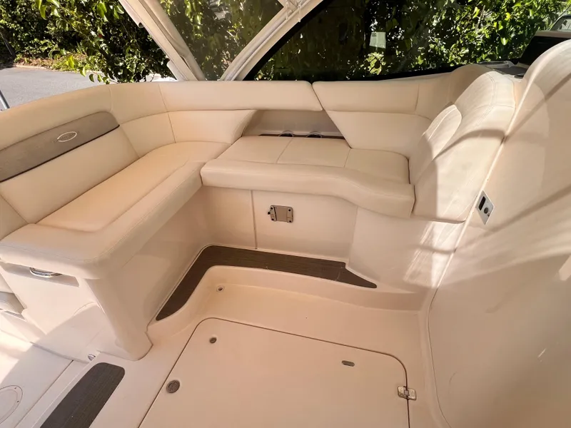 Slide: The Image of 2016 Grady-White Freedom 375 boat interior with beige seating and sleek design. - 16