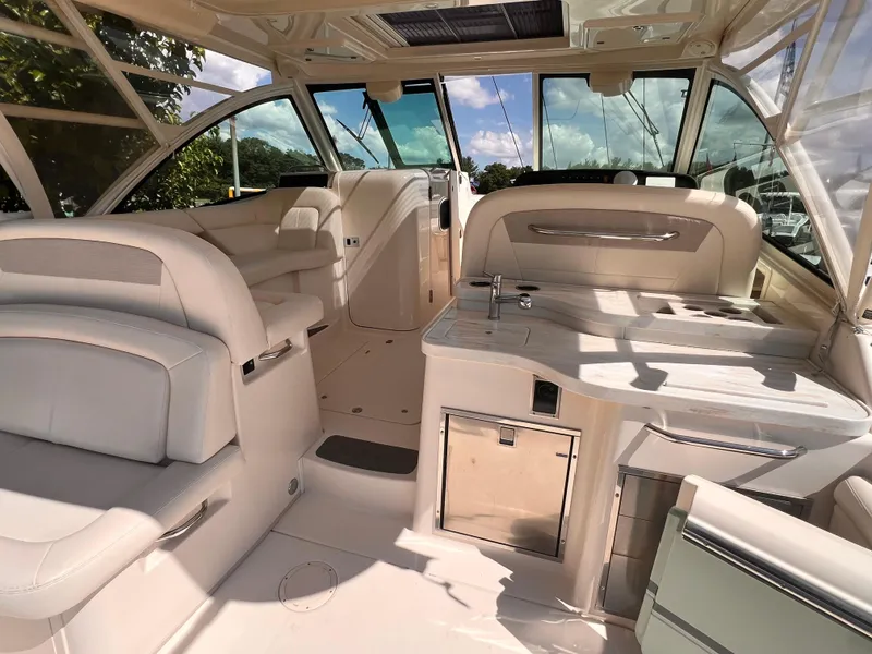 Slide: The Image of Interior of 2016 Grady-White Freedom 375 boat, featuring luxurious seating and modern amenities. - 20