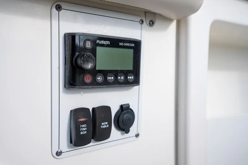 Slide: The Image of Control panel on 2020 Boston Whaler 380 Outrage boat with Fusion MS-NRX300. - 18