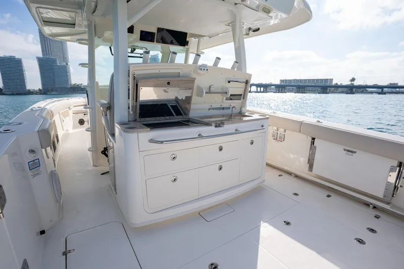 Slide: The Image of 2020 Boston Whaler 380 Outrage boat interior with sleek design and modern amenities. - 27