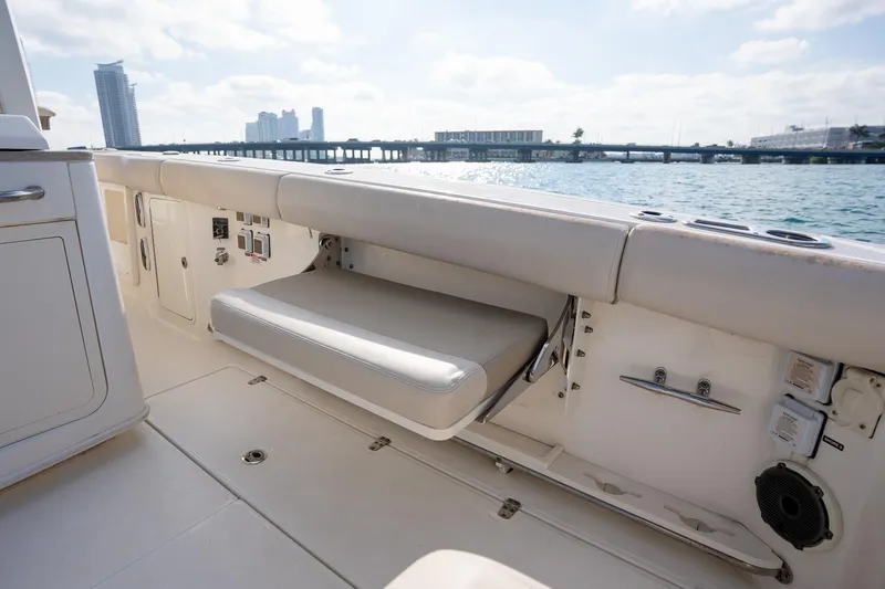 Slide: The Image of 2020 Boston Whaler 380 Outrage boat interior with seating and ocean view. - 29