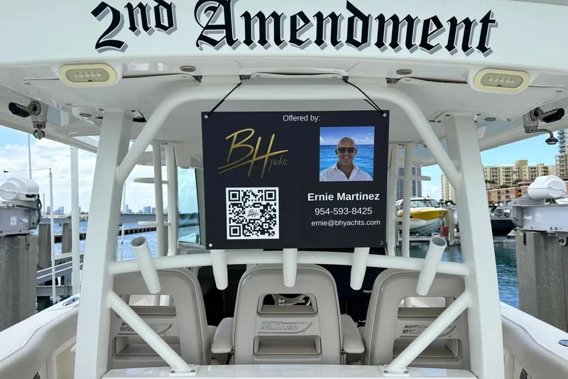 Slide: The Image of Boston Whaler 380 Outrage 2020 boat with "2nd Amendment" sign and contact information displayed. - 40
