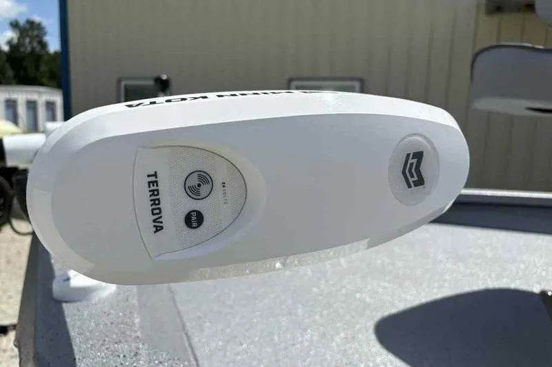 Slide: The Image of Minn Kota Terrova motor on 2026 Xpress H22 Bay boat, close-up view. - 12