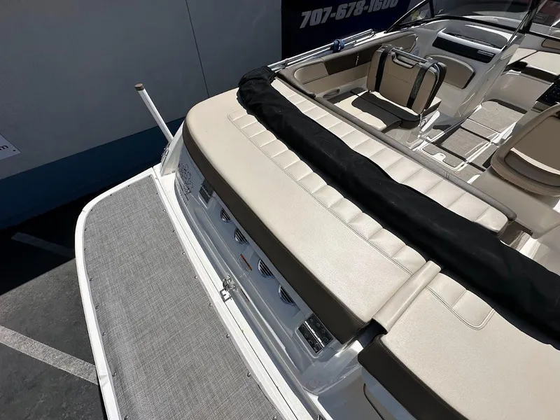 Slide: The Image of 2017 Bayliner VR5 Bowrider boat interior with beige seating and swim platform. - 13