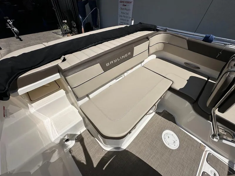 Slide: The Image of 2017 Bayliner VR5 Bowrider interior with beige seating and Bayliner logo. - 15