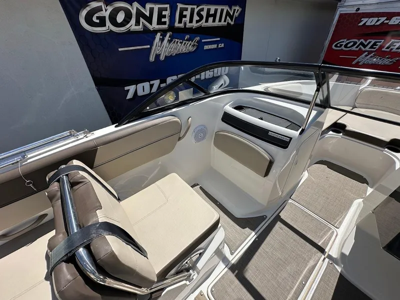 Slide: The Image of 2017 Bayliner VR5 Bowrider interior with seating and dashboard, displayed at Gone Fishin' Marine. - 18