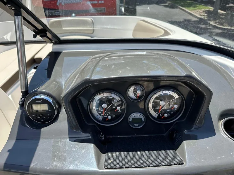 Slide: The Image of Dashboard of a 2017 Bayliner VR5 Bowrider boat with gauges and controls. - 24